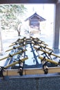 The purification fountain `Chozuya` in the Japanese shrine. Royalty Free Stock Photo