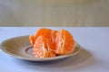 Purified mandarin on the light surface of the table Royalty Free Stock Photo