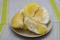 Purified pomelo lying in a plate Royalty Free Stock Photo