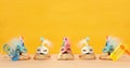 Purim celebration concept jewish carnival holiday hats and masks over wooden