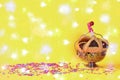Purim holiday concept with confetti, hamantaschen cookies or ozney haman in hebrew over bokeh lights background.