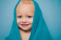 Purity and hygiene education. Child in clean and dry towel. Happy bath time. Image of cute baby boy covered with towel Royalty Free Stock Photo