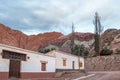 Purmamarca town with the Hill of Seven Colors Cerro de los siete colores on background - Purmamarca, Jujuy, Argentina Royalty Free Stock Photo