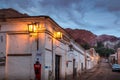 Purmamarca town at night with the Hill of Seven Colors Cerro de los siete colores on background - Purmamarca, Jujuy, Argentina Royalty Free Stock Photo