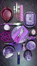 Purple aesthetic creative concept flatlay with purple theme tableware.