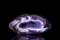 Purple Agate Druse in front of Black