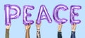 Purple alphabet balloons forming the word peace Royalty Free Stock Photo