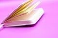 empty notebook on purple background Royalty Free Stock Photo