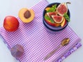 Purple background. Fruit salad in a blue vase with fresh fruits. Copy space for your text. Selective focus.Purple background. Royalty Free Stock Photo