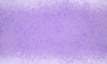 Purple background with white grunge borders and smeared sponged and distressed paint texture, old vintage lavender purple design Royalty Free Stock Photo