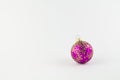 Purple ball for christmas tree on white background Royalty Free Stock Photo