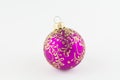 Purple ball for christmas tree on white background Royalty Free Stock Photo