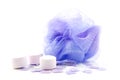 Purple bath sponge with salts