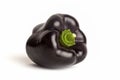 Purple bell pepper in white background