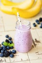 Purple berry and banana smoothie, healthy diet food