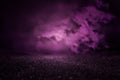 Purple and black abstract background with bokeh defocused lights. Royalty Free Stock Photo