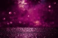 Purple and black glitter lights background. defocused. Royalty Free Stock Photo