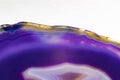 Purple and Blue agate slice crystal , banded chalcedony stone Royalty Free Stock Photo