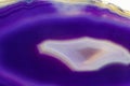 Purple and Blue agate slice crystal , banded chalcedony stone Royalty Free Stock Photo