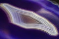 Purple and Blue agate slice crystal , banded chalcedony stone Royalty Free Stock Photo