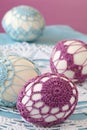 Purple and blue crochet Easter eggs Royalty Free Stock Photo