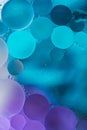 Purple, Blue Gradient Oil drops in the water -abstract background Royalty Free Stock Photo