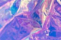 Purple blurred holographic wallpaper. Wrinkled liquid foil texture