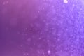 Purple bokeh gradient background with soft glow, floating light particles and dreamy abstract surface. Copy space Royalty Free Stock Photo