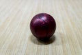 Purple bowling ball on the track in the bowling center Royalty Free Stock Photo