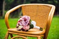 Purple bridal bouquet on a chair