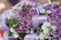Purple Bridal Bouquet Close up With Purple Flowers and Lily of the Valley