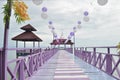 The purple bridge on the blue sea Royalty Free Stock Photo