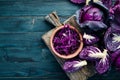 Purple cabbage on a blue wooden background. Organic food. Royalty Free Stock Photo