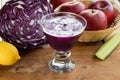 Purple cabbage juice with apples, cucumber and lemon Royalty Free Stock Photo