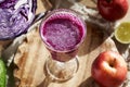 Purple cabbage juice with fresh cabbage and apples Royalty Free Stock Photo