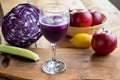 Purple cabbage juice in a wine glass Royalty Free Stock Photo