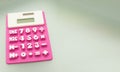 Purple calculator made of rubber use math calculations with copy space