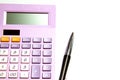 Purple calculator and pen