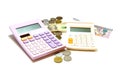 Purple calculator and white calculator with money