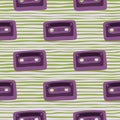 Purple cassette doodle seamless pattern. Disco print on green stripped background. Hipster print