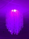 Purple ceiling light with hanging crystal beads. Royalty Free Stock Photo