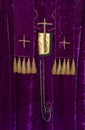 Purple Christian Vestment with gold crosses for worship service.