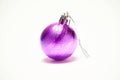 Purple Christmas ball on a white background, New Year, Christmas toys, holiday, Christmas. Royalty Free Stock Photo