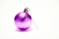 Purple Christmas ball on a white background, New Year, Christmas toys, holiday, Christmas. Royalty Free Stock Photo