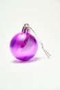 Purple Christmas ball on a white background, New Year, Christmas toys, holiday, Christmas. Royalty Free Stock Photo