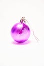 Purple Christmas ball on a white background, New Year, Christmas toys, holiday, Christmas. Royalty Free Stock Photo