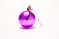 Purple Christmas ball on a white background, New Year, Christmas toys, holiday, Christmas. Royalty Free Stock Photo