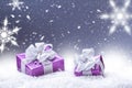 Purple christmas gift snow and abstract snowy background Royalty Free Stock Photo