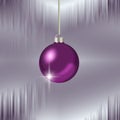 Icicles and hanging purple Christmas ornament Royalty Free Stock Photo