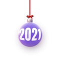 Purple christmas tree ball with white 2021 sign Royalty Free Stock Photo